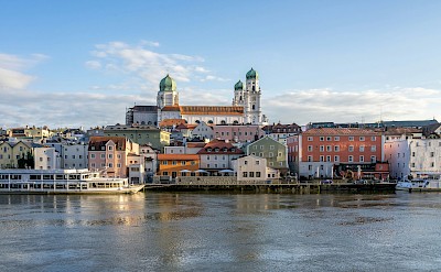 Colorful waterfront of Passau, Germany. Unsplash@Leonhard Niederwimmer