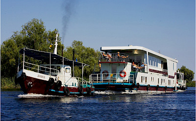 Hotel boat. Danube Delta Bike Tour in Romania. Photo via TO