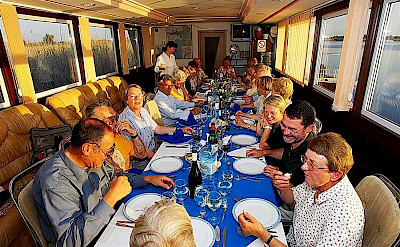 Dining on board the hotel boat.