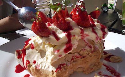 Pavlova is a very traditional dessert in New Zealand! Photo via Flickr:jem