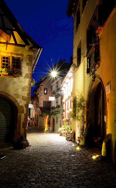 Riquewihr is known for its Riesling wine. Alsace, France. Photo via Flickr:Pug Girl