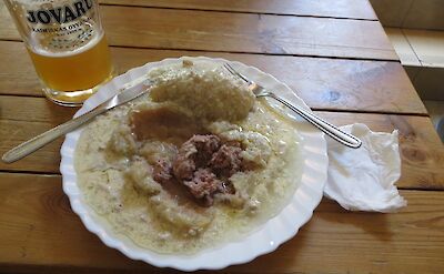 <i>Cepelinai</i>, a traditional potato dish with meat & gravy in Lithuania. Flickr:Bernt Rostad