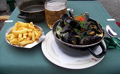Moules frite (mussels & fries) with beer in Belgium. Flickr:Colin Cameron