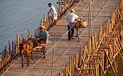 Bamboo bridge in Kompong Cham, Cambodia. Photo via Flickr:paularps
