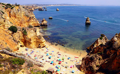 From bike to beach for some swimming, Algarve, Portugal. Photo via Flickr:Rodrigo Gomez Sanz