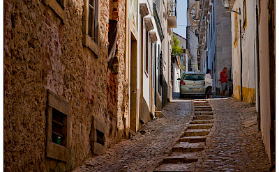 Street in Tavira, Algarve, Portugal. Photo via Flickr:tolbxela