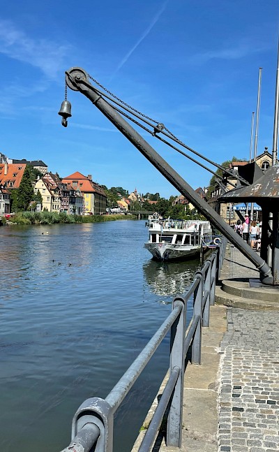 Crane by the river in Bamberg, Germany. Unsplash@Bernd M Schell