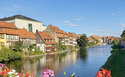 Flowers on a bridge in Bamberg, Germany. Unsplash@Raelinn Doty Schmitt