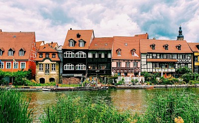 Houses along the river in Bamberg, Germany. Unsplash@Sebastian Puskeiler