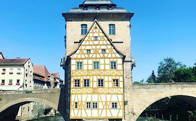 View of the Altes Rathaus from the river, Bamberg, Germany. Unsplash@Frederico Carvalho