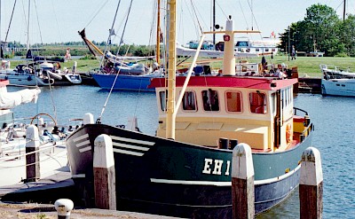 Boats in the harbor, Enkhuizen, Netherlands. Unsplash@Chris Weiher