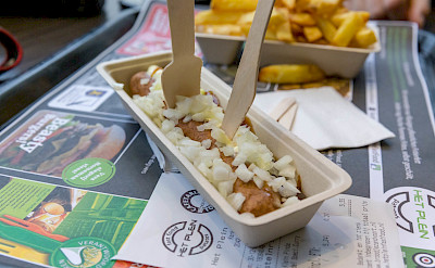 Traditional Dutch treat - frikandel with fries. Flickr:Marco Verch