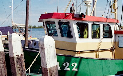 Green boat, Enkhuizen, Netherlands. Unsplash@Chris Weiher