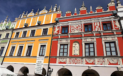 Gorgeous colorful buildings in Zamosc. Photo via Flickr:PolandMFA