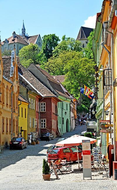 Street in Sighisoara, Transylvania, Romania. Photo via Flickr:Dennis Jarvis
