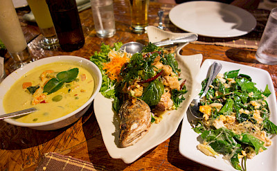 Curry soup and fresh fish in Kuraburi, Thailand. Photo via Flickr:Kent Wang