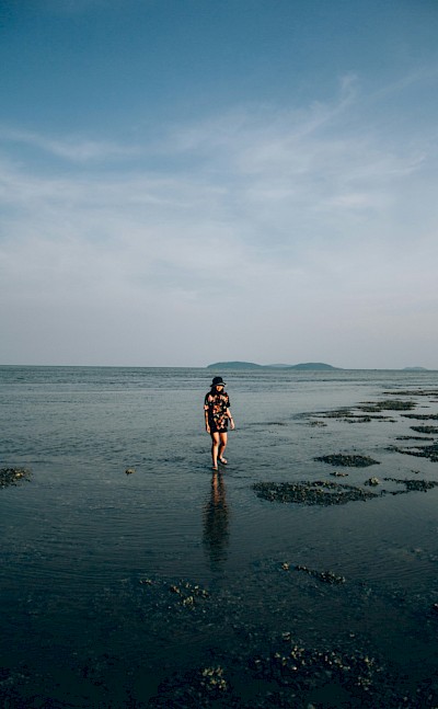 On the beach in Chumphon, Thailand bike tour. Unsplash@Thitipark Sodchuen