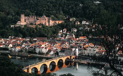Heidelberg&rsquo;s old town and castle overlook the Neckar River in southern Germany. unsplash@angel tasevski