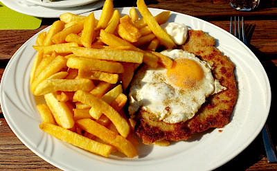 Schnitzel mit Speigelei, a favorite in Germany. Photo via Flickr:Thomas Kohler