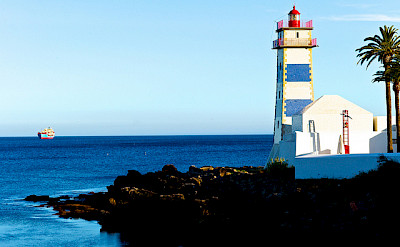 Blue coast in Cascais, Portugal. Photo via Flickr:Pedro Ribeiro Simoes