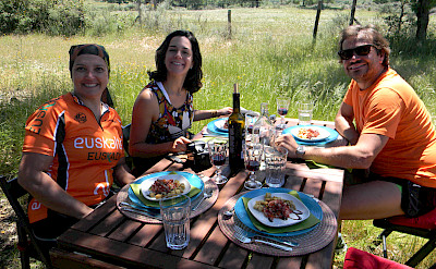 Bike riders enjoying a picnic break along the Blue Coast of Portugal tour.