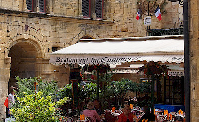 Off the bike for a cafe stop in Sarlat, France. Flickr:Mike Fleming