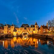 Discovering Holland’s Hidden Gems - Koppelpoort, a medieval gate from 1425 in Amersfoort, Utrecht. ©Hollandfotograaf 52.158972, 5.385274