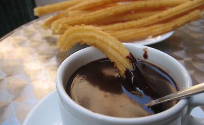 Churros with chocolate dipping sauce! Flickr:Sami Keinanen