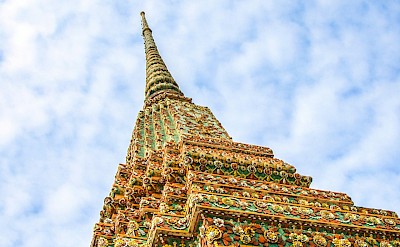 Ornate temple tower in Bangkok, Thailand bike tour. Unsplash@Vince