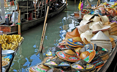 Hats for sale at Damnoen Saduak Floating Market near Bangkok, Thailand. Flickr:Dennis Jarvis
