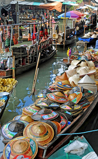 Hats for sale at Damnoen Saduak Floating Market near Bangkok, Thailand. Flickr:Dennis Jarvis