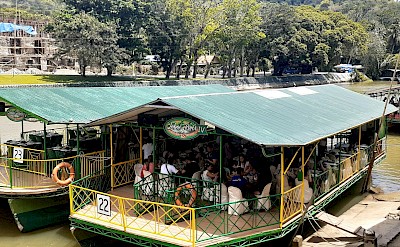 Barges in Loboc, Philippines. Unsplash@R Serrano