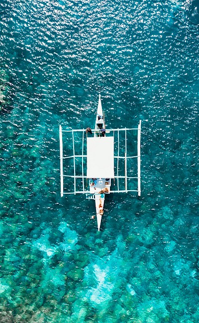 Boat from above, Cebu, Philippines. Unsplash@Emjeii Beattie