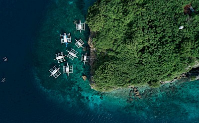 Boats on the coast, Cebu, Philippines. Unsplash@Ken Suarez