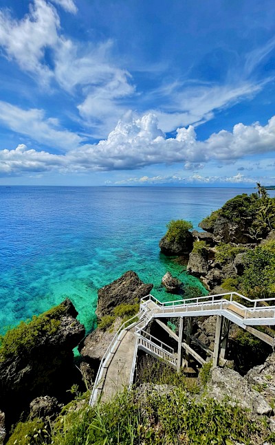 Steps down to the ocean, Siquijor, Philippines. Unsplash@Nikko Lawrence