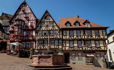 Colorful half-timbered houses in the square in Miltenberg. Photo via Flickr:Carsten Frenzl