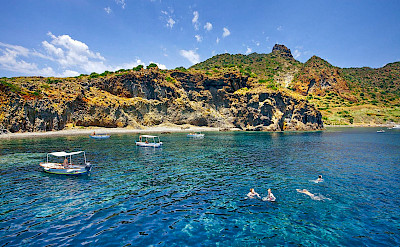 Swimming, biking and boating on the Aeolian Islands in Sicily, Italy.