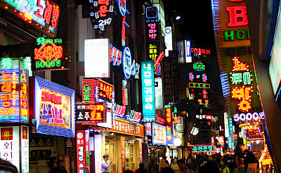 Bustling nightlife in Seoul, South Korea. Photo via Flickr:Philippe Teuwen