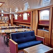 Lounge, dining and bar area | Elizabeth | Bike & Boat Tour