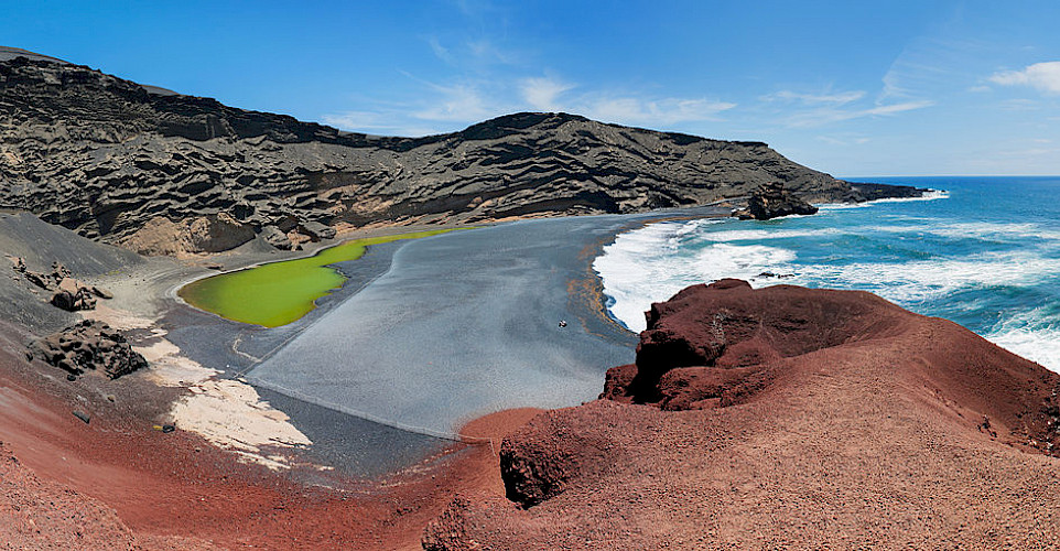 Seaside volcano crater at El Golfo, Lanzarote, Canary Islands. Photo via Wikimedia Commons:Stefan Krause
