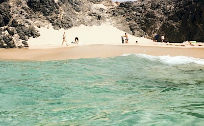 View of a beach from the sea, Lanzarote, Spain. Unsplash@Olga Mai