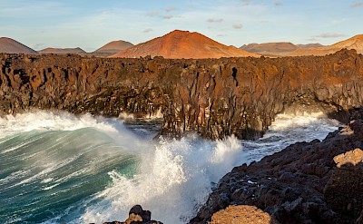 Waves crashing on volcanic rocks, Lanzarote, Spain. Unsplash@Getty Images