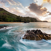 Hawaii - Island Dreams - Some rough easterly swells swirling round & round this interesting spot of rocks in the foreground. Lumahai Beach, Kauai, Hawai 20.004191, -155.824864