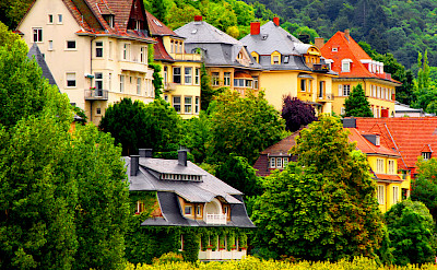 Houses along the Neckar River in Heidelberg, Germany. Photo via Flickr:Tobias von der Haar
