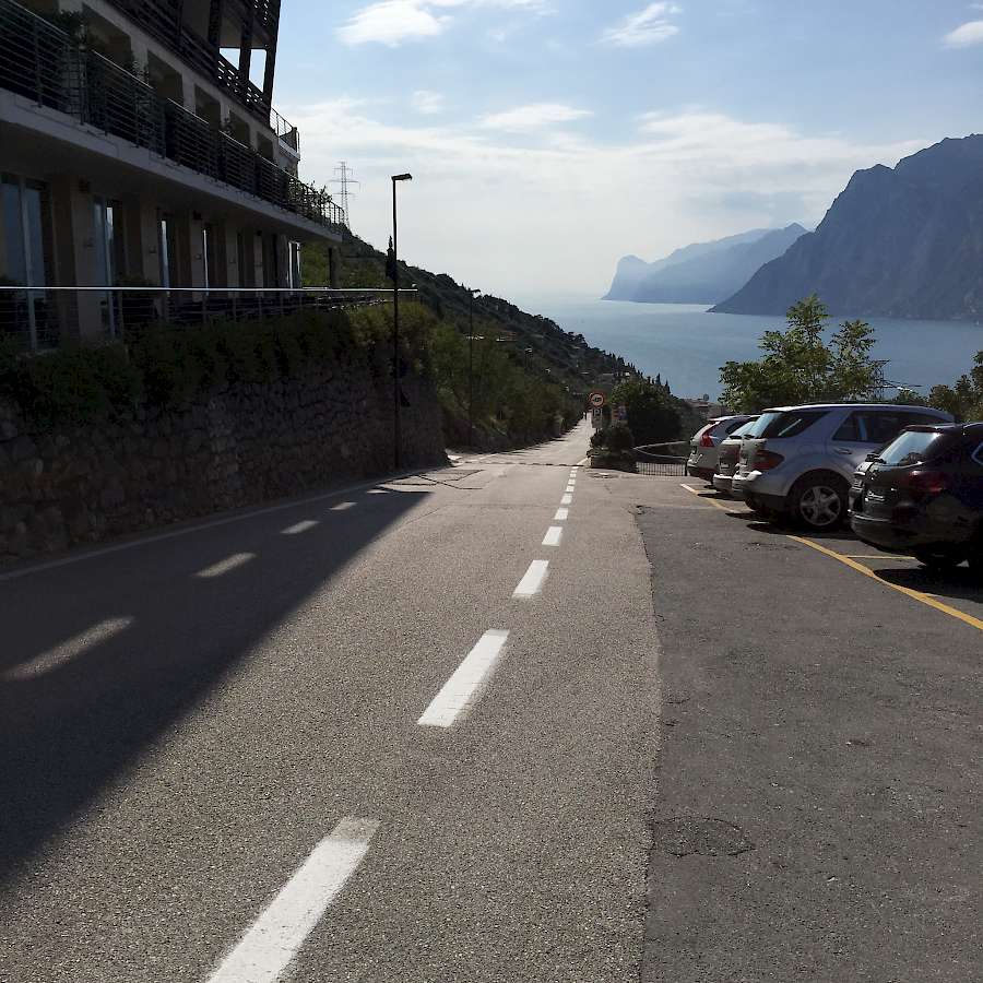 Epic downhill with Lake Garda in the distance