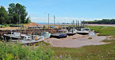 Awaiting the tide in Blomidon, Nova Scotia, Canada. Photo via Flickr:Ashley Coombs