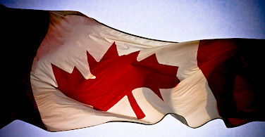 Flag of Canada. Photo via Flickr:Alex Indigo