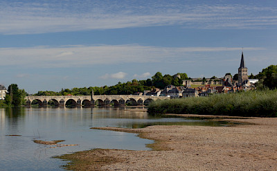Biking into La Charité sur Loire, France. Photo via Flickr:akial