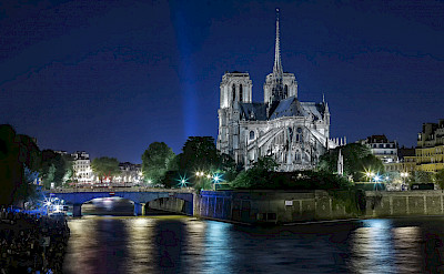 Notre Dame Cathedral at night in Paris, France. Photo via Flickr:Henry Marion