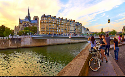 Notre Dame Cathedral in Paris along the Seine River. Photo via Flickr:Moyan Brenn